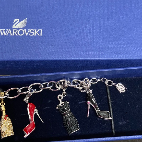 Stunning Swarovski charm bracelet. Dresses and shoes charms! Brand new - Picture 8 of 9